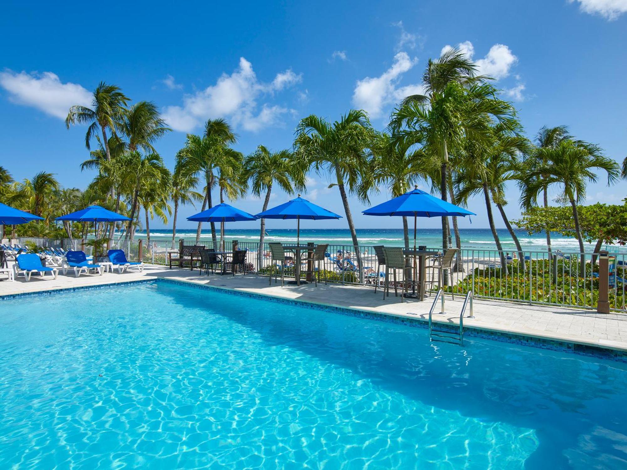 Coconut Court Beach Hotel Christ Church Exterior foto